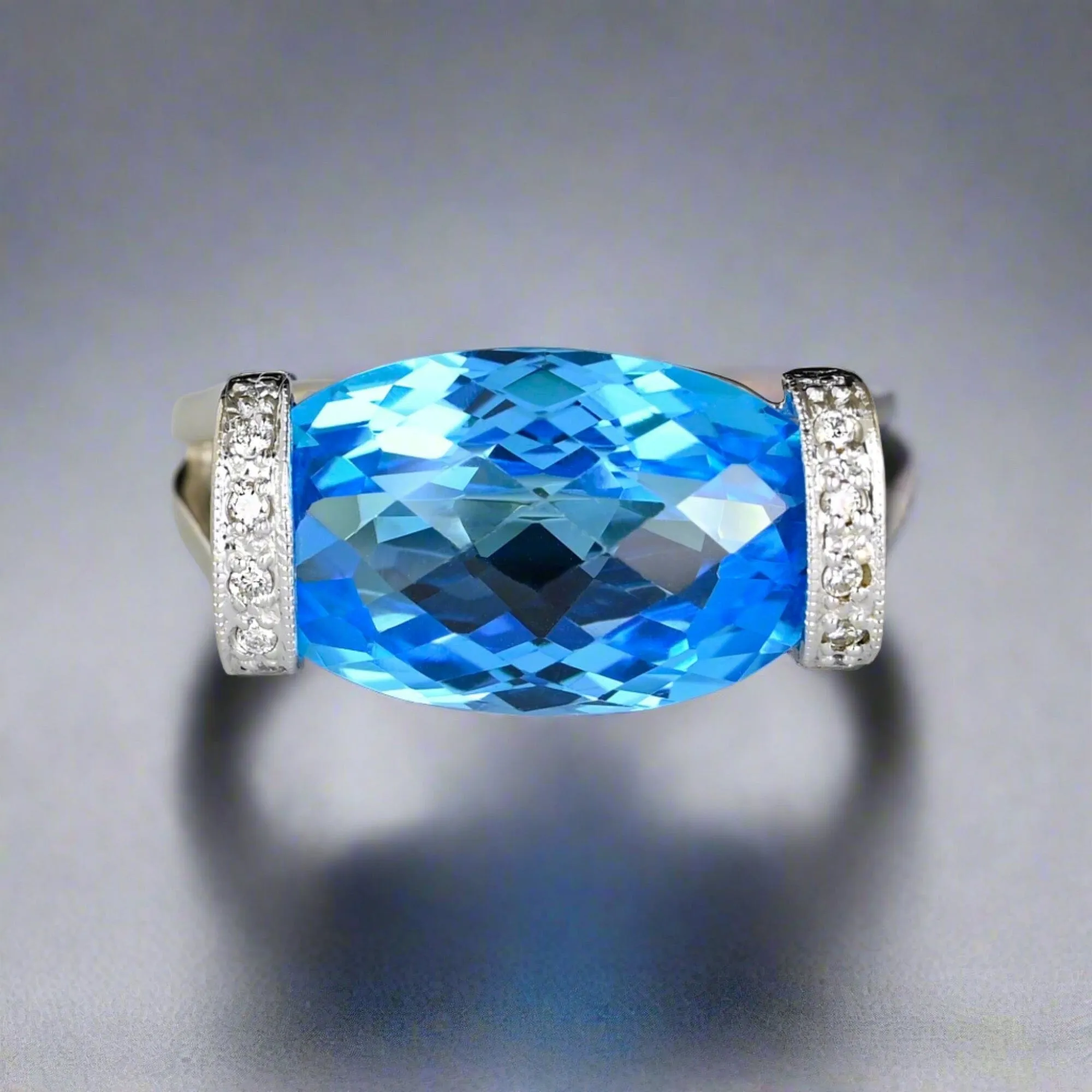 14K White Gold Checkerboard Blue Topaz Diamond East West Ring