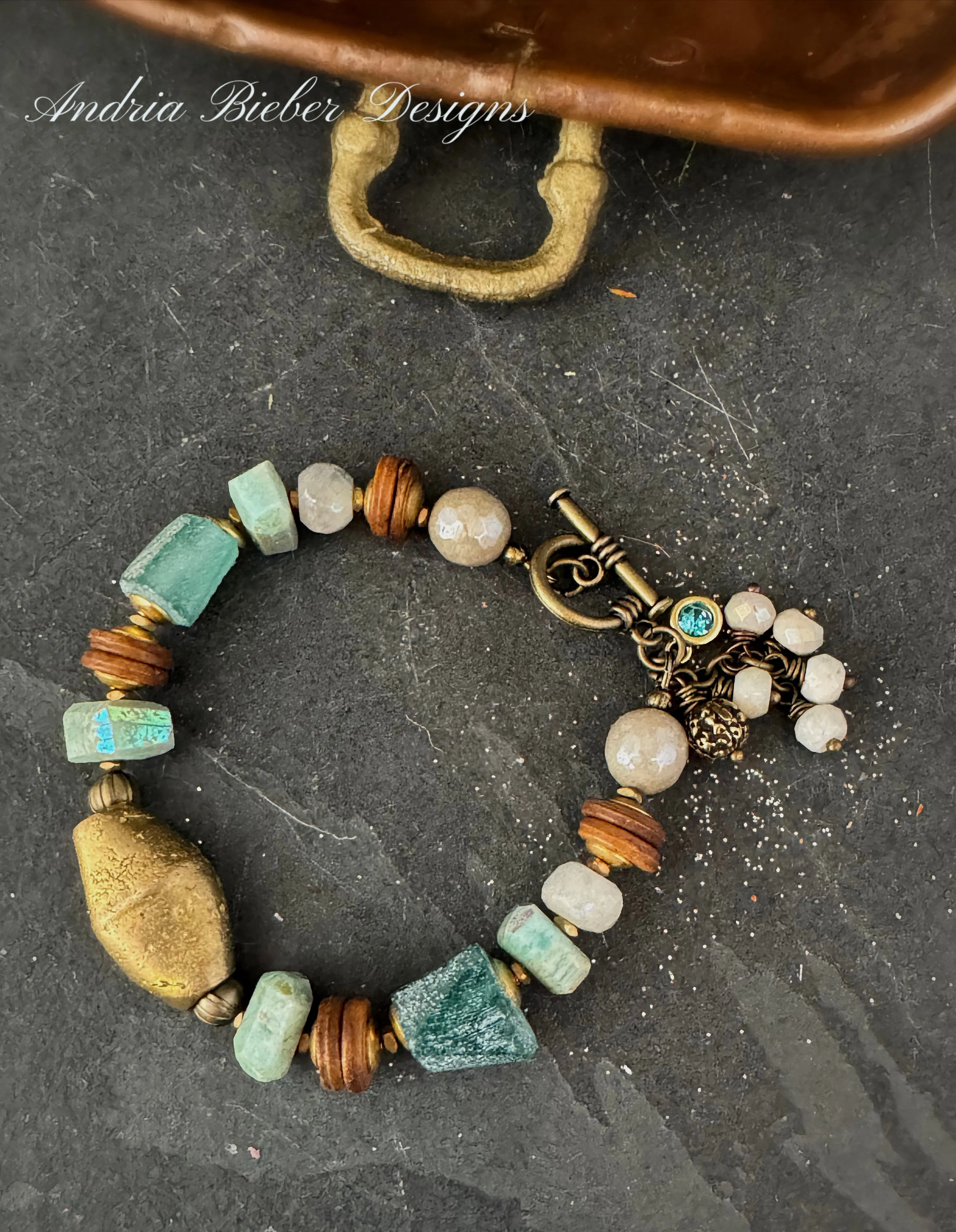 Amazonite luster stone, moonstone, african brass, roman glass, bone, bracelet.