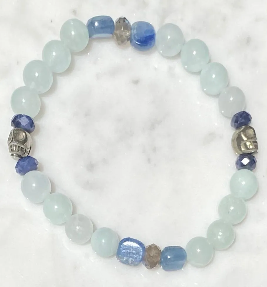 Aquamarine, labradorite, blue sapphires, pyrite skull, and kyanite gemstone bracelet