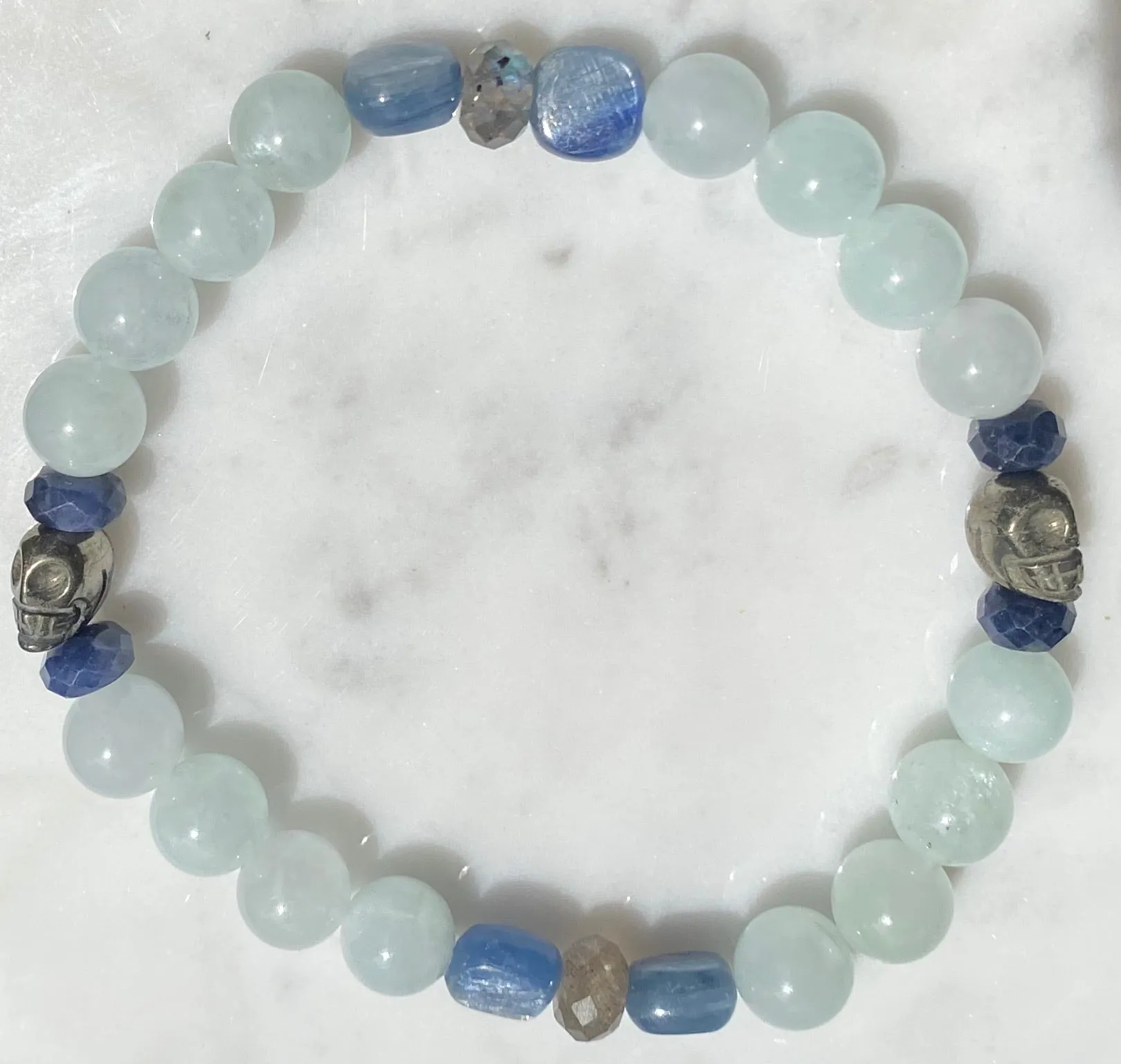 Aquamarine, labradorite, blue sapphires, pyrite skull, and kyanite gemstone bracelet