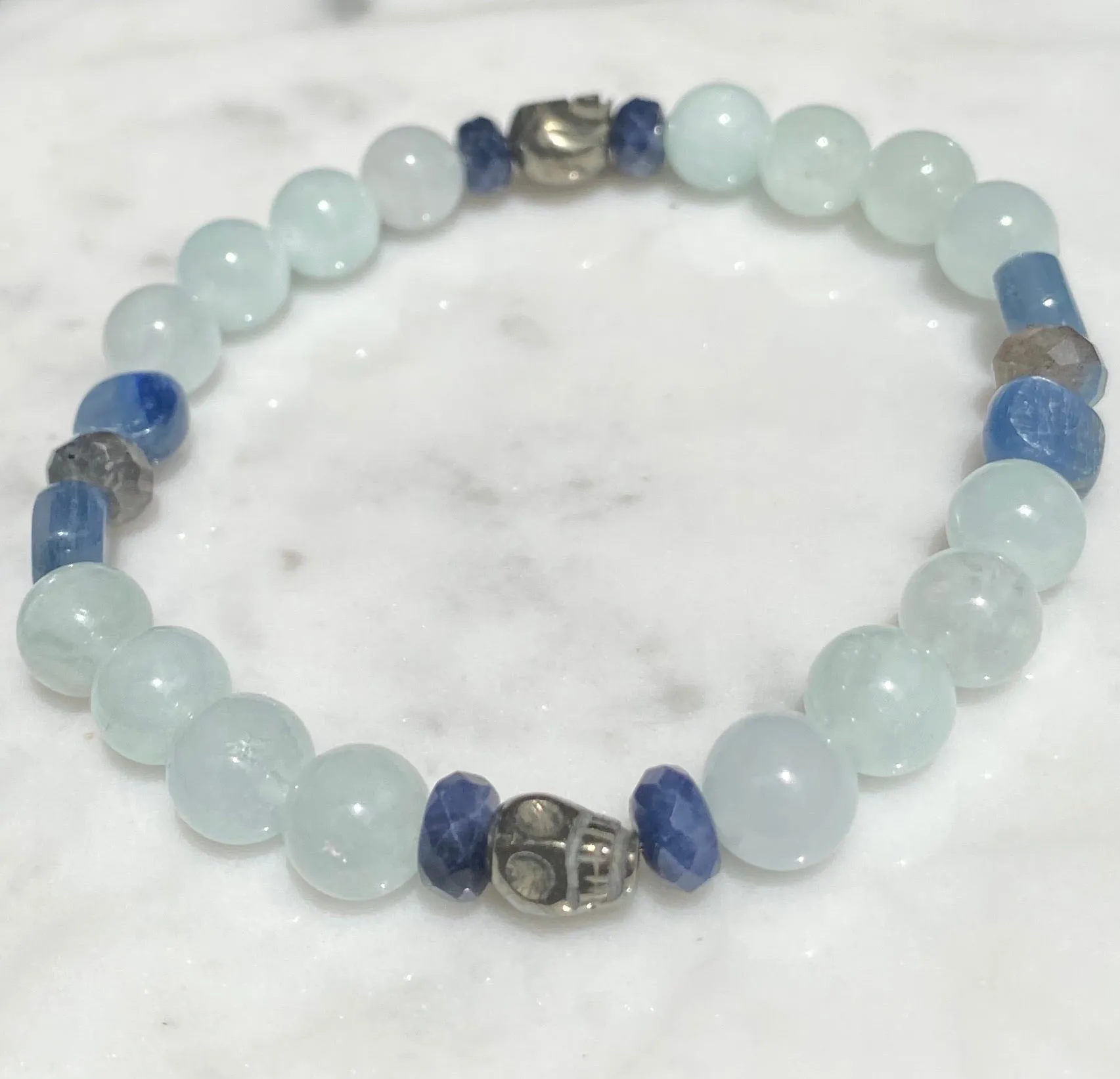 Aquamarine, labradorite, blue sapphires, pyrite skull, and kyanite gemstone bracelet