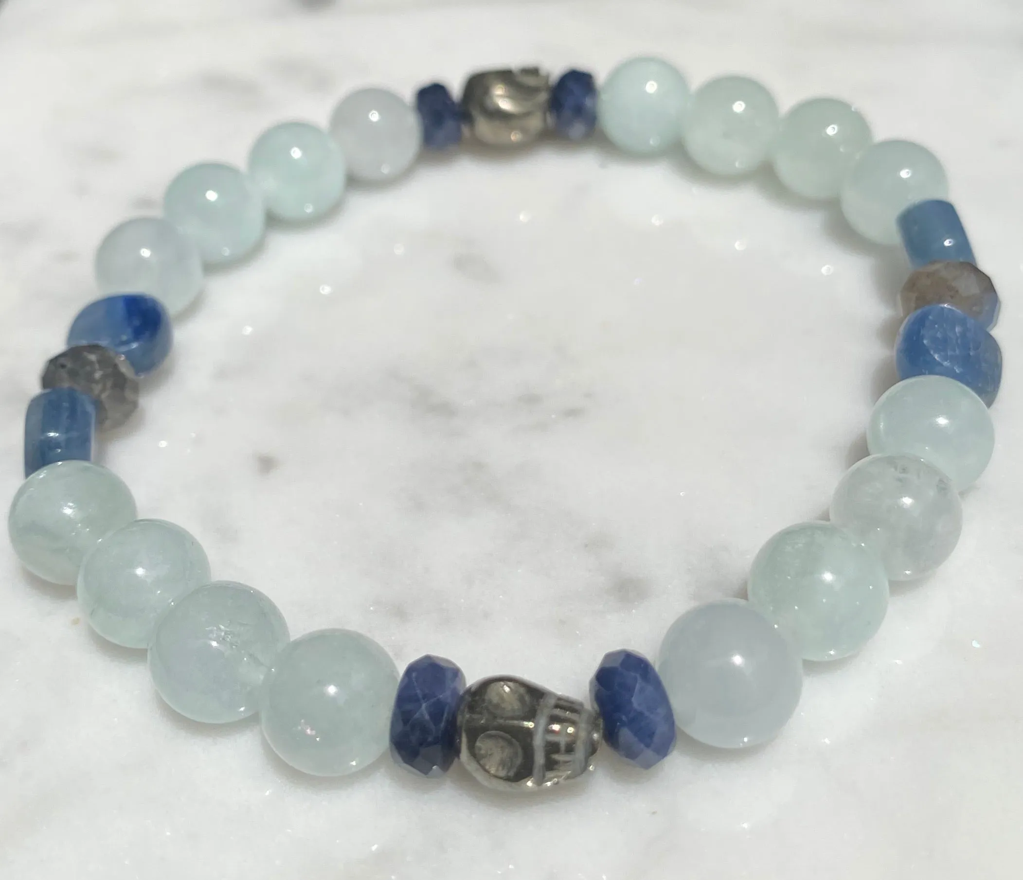 Aquamarine, labradorite, blue sapphires, pyrite skull, and kyanite gemstone bracelet