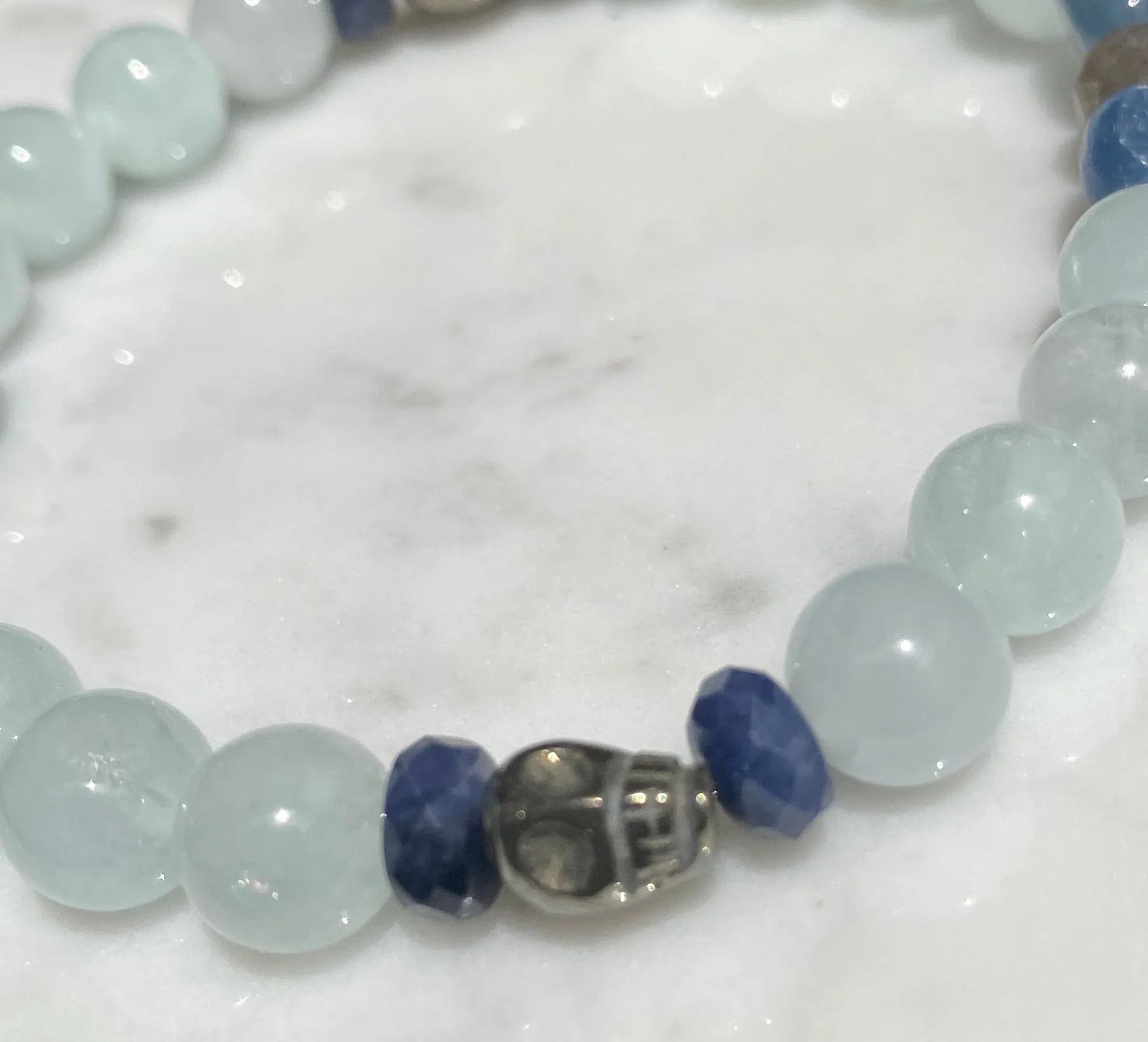 Aquamarine, labradorite, blue sapphires, pyrite skull, and kyanite gemstone bracelet